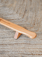 Side view showing the raised design of the Shena Board