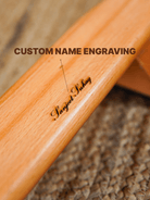 Close-up of custom name engraving on the Shena Board