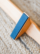 Close-up of the blue anti-slip pad under the Shena Board