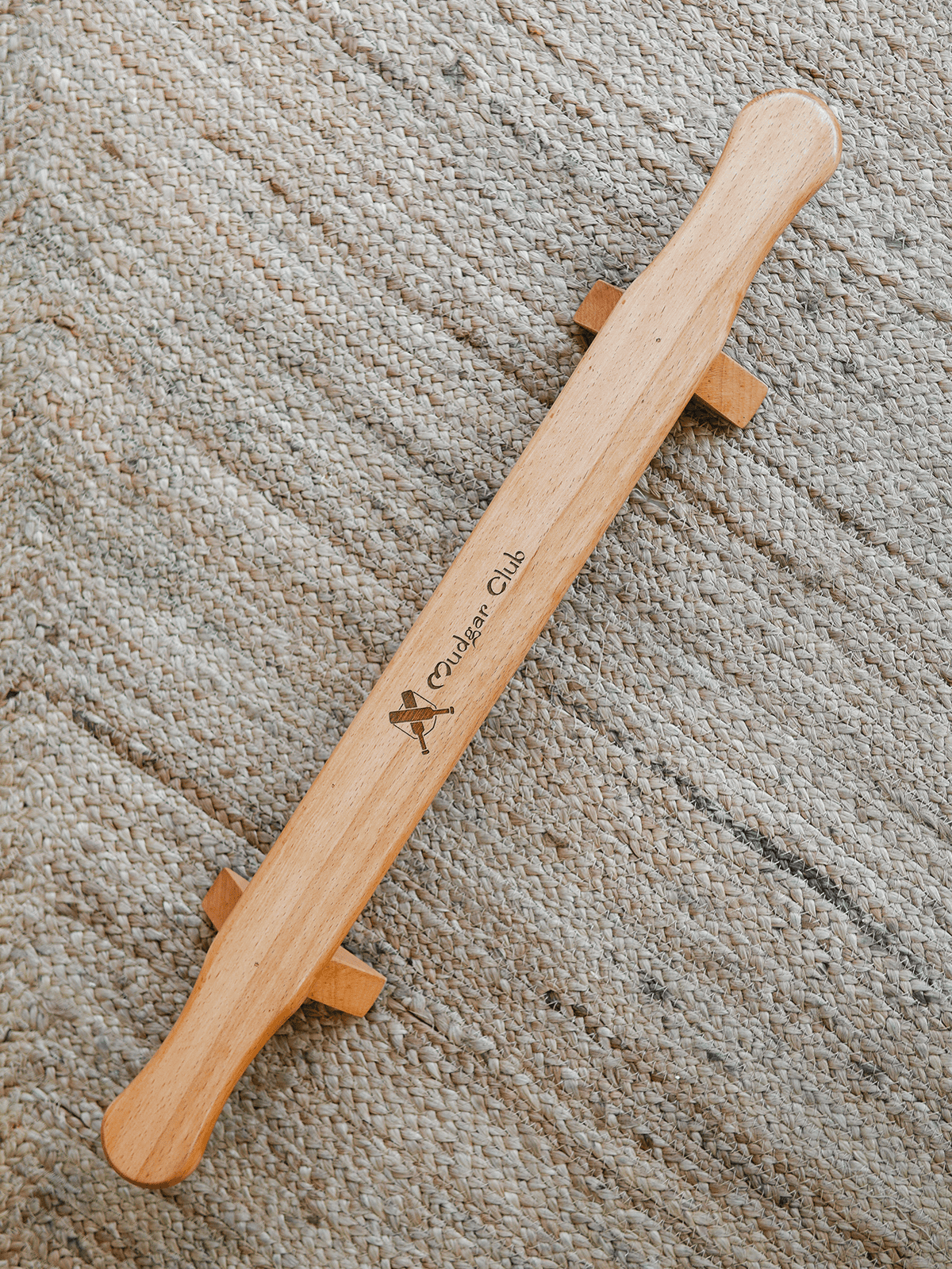 Angled top view of the wooden Shena push-up board