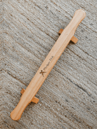 Angled top view of the wooden Shena push-up board